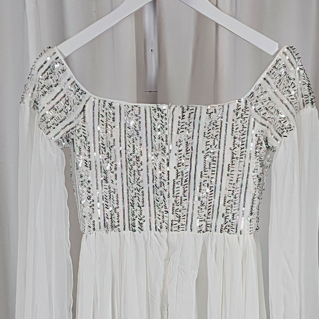 Enchanted Elegance: The Dreamy Off-Shoulder Maxi Dress