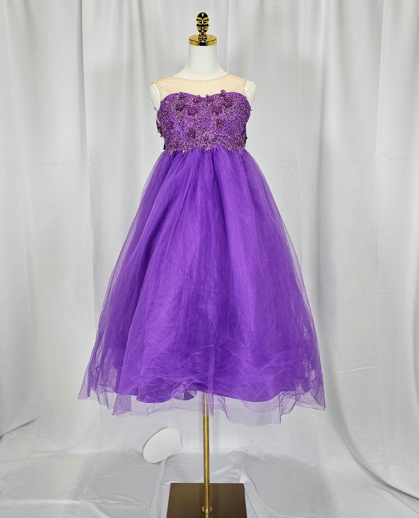 Regal Radiance: Whimsical Purple Gown for Enchanting Occasions