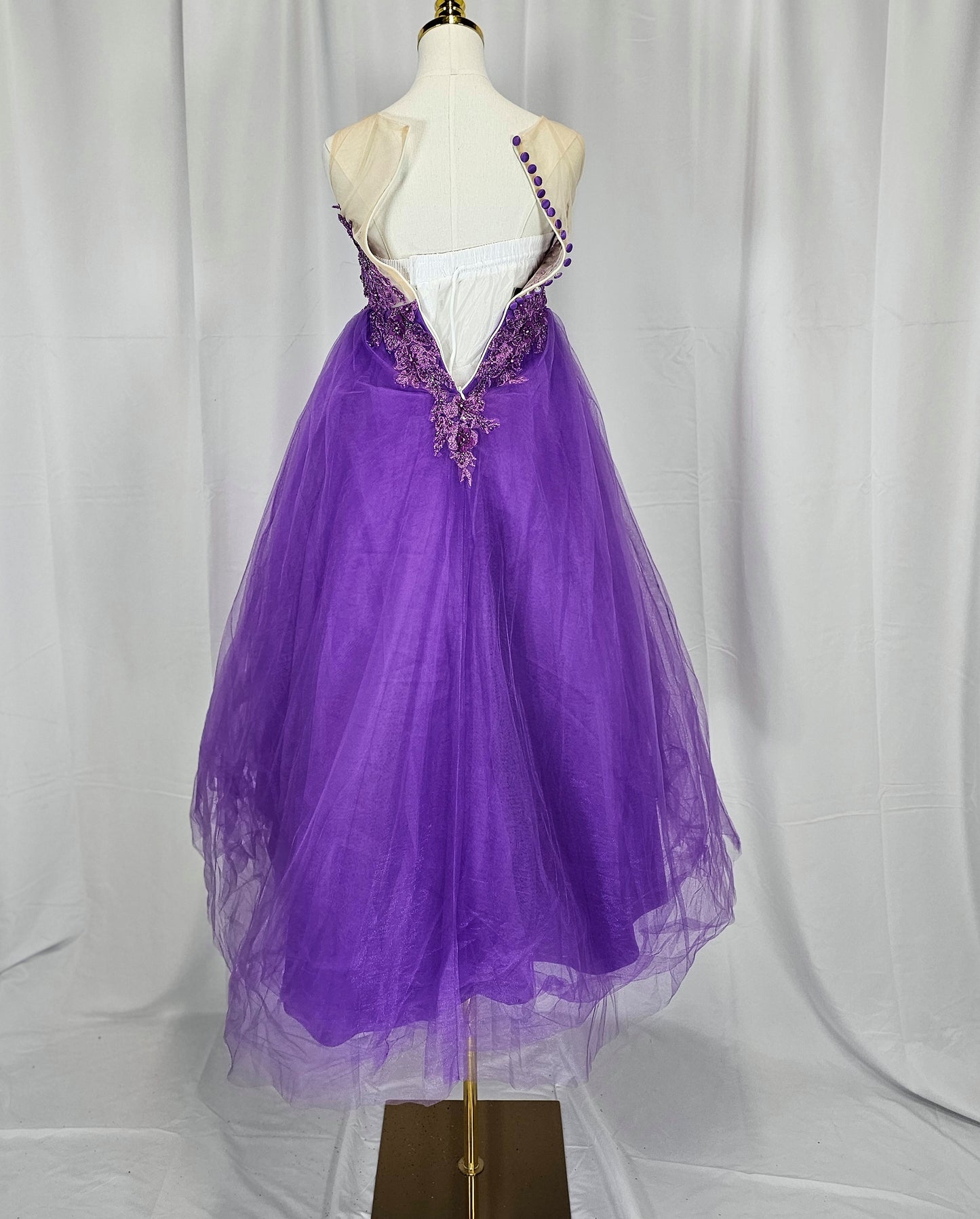 Regal Radiance: Whimsical Purple Gown for Enchanting Occasions