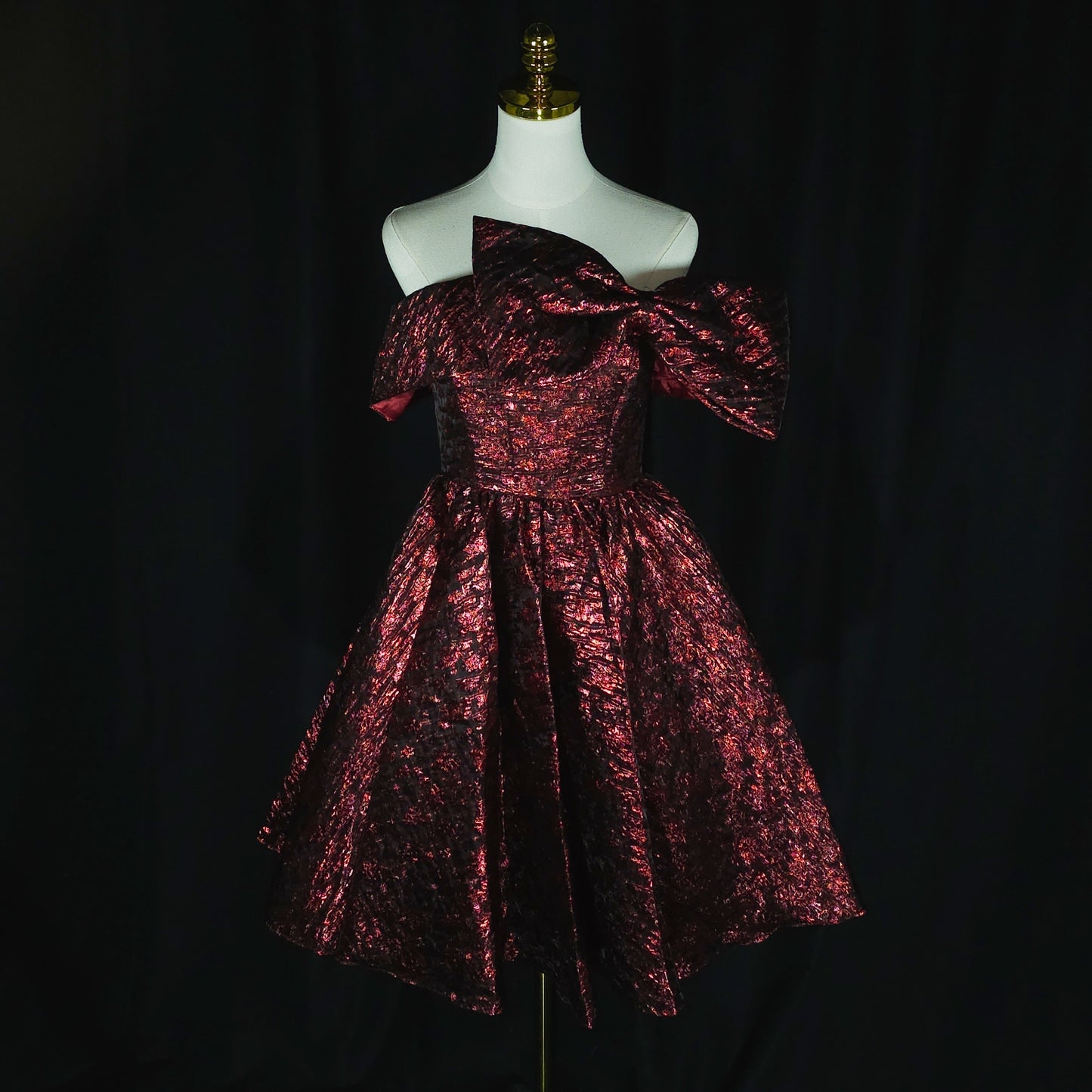 Scarlet Symphony: The Dramatic Bow Dress of Dreams