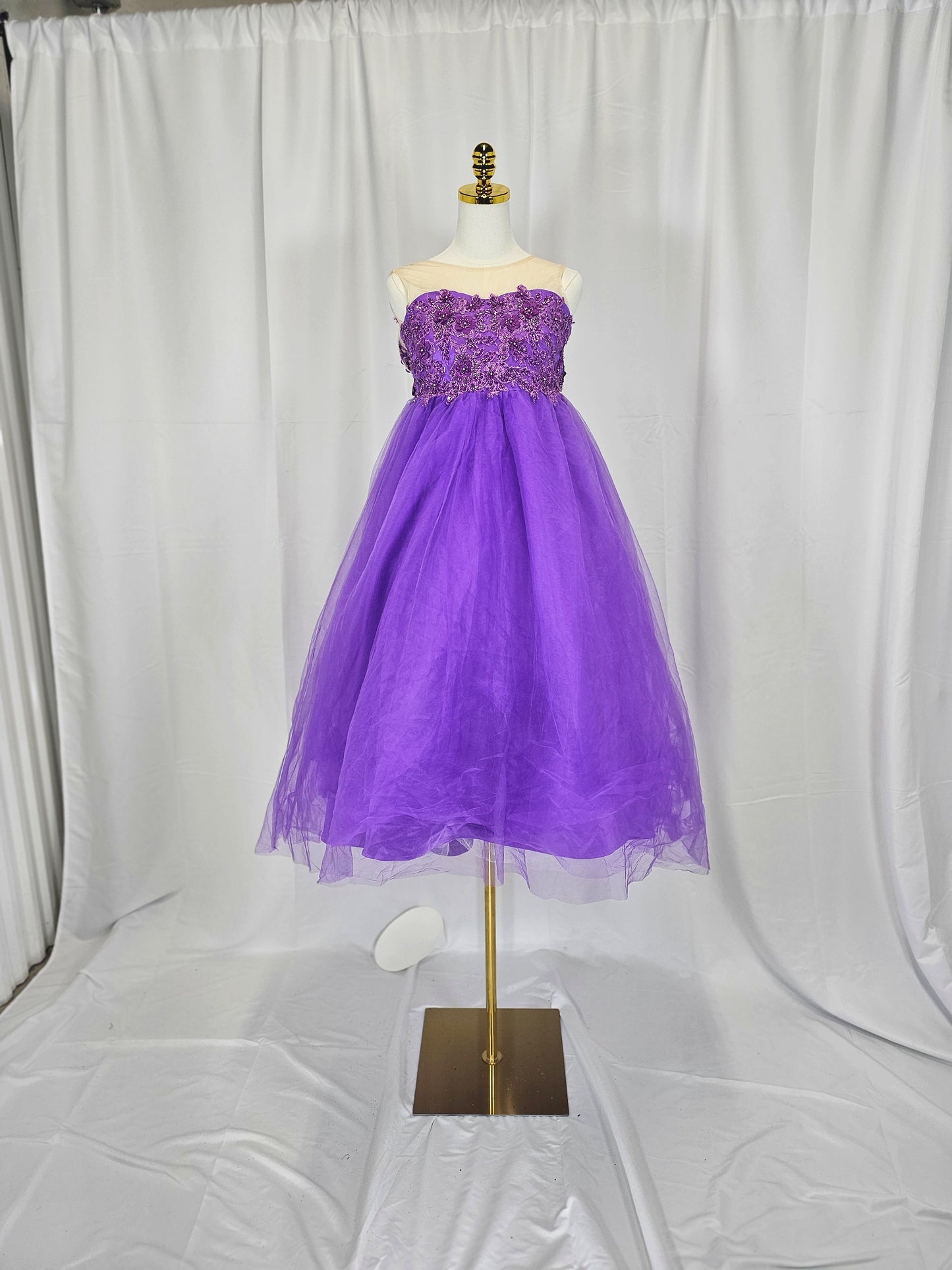 Regal Radiance: Whimsical Purple Gown for Enchanting Occasions