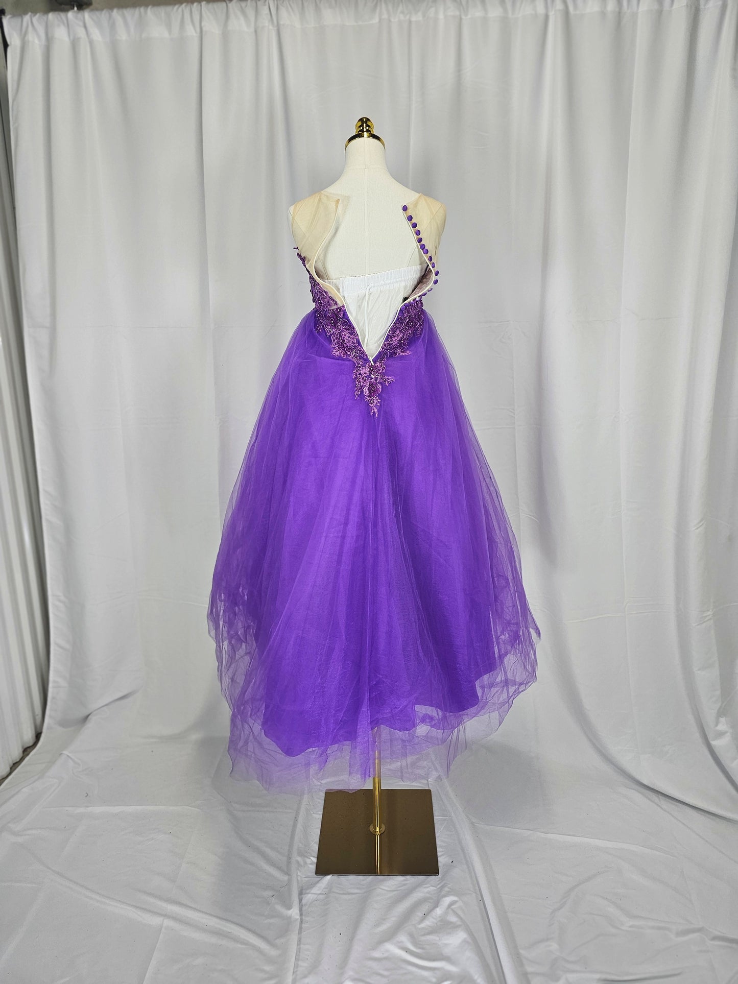 Regal Radiance: Whimsical Purple Gown for Enchanting Occasions