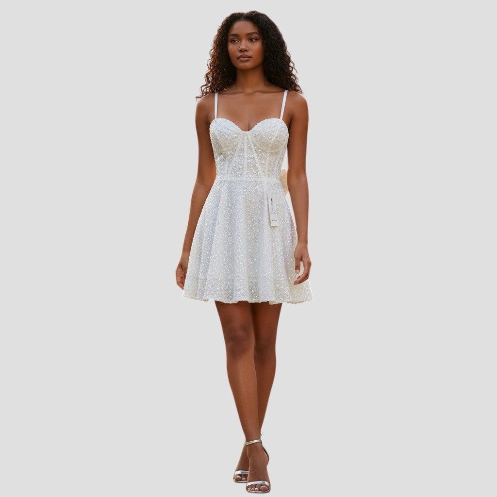 Sparkle & Shine: The Dazzling Little White Dress